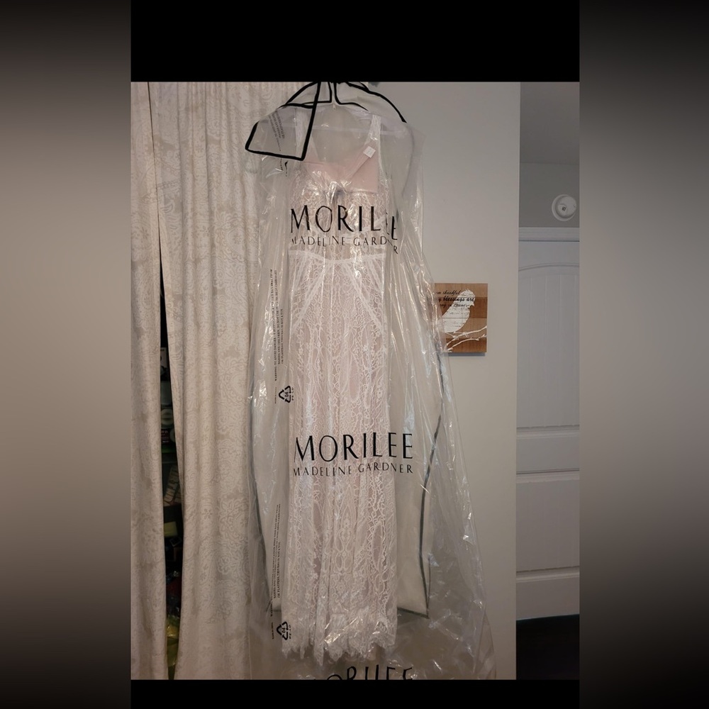 Size 20 Morilee wedding dress. Never worn. New with tags. Style #5905.